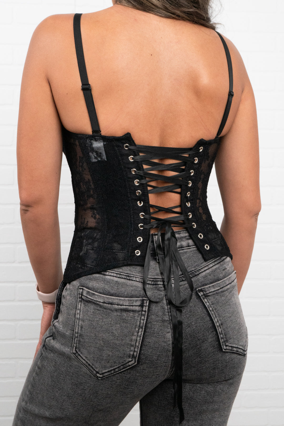 Alina Lace Peplum Corset Top with adjustable lace-up back, straps and bra cups.